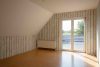 Großzügiges Mehrfamilienhaus mit vielen Nutzungsmöglichkeiten in bevorzugter Lage von Wittmund! - Zimmer mit Ausgang zur...