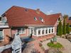 Großzügiges Mehrfamilienhaus mit vielen Nutzungsmöglichkeiten in bevorzugter Lage von Wittmund! - Blick vom Garten