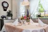 Neuharlingersiel: voll ausgestattetes Hotel-Restaurant „Poggenstool“ mit großzügiger Eigentümer-Wohnung - gemütlicher Sitzbereich