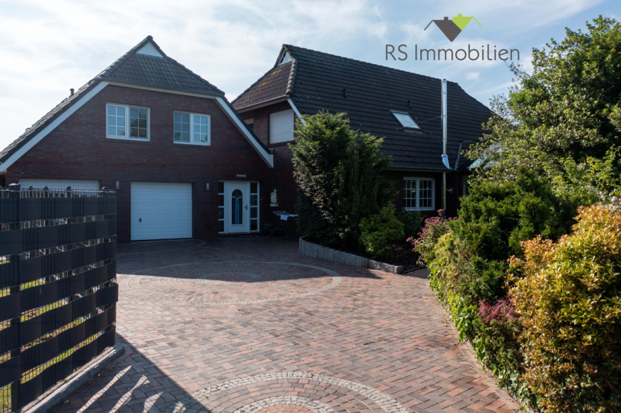 Titelbild - Großzügige Wohnung mit pflegeleichtem Garten