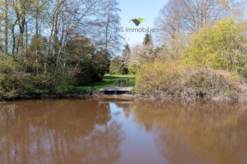 Großzügiges Landhaus mit drei Einheiten und Zugang zum Wasser, 26553 Dornum, Einfamilienhaus