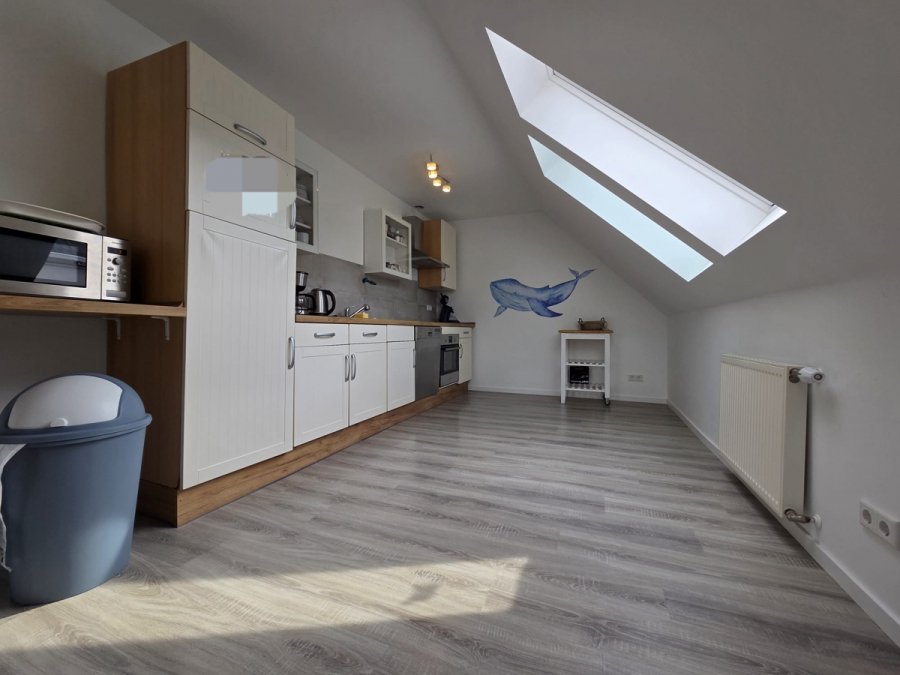 Küchenbereich - Gemütliche, voll möblierte OG-Wohnung im Herzen von Carolinensiel